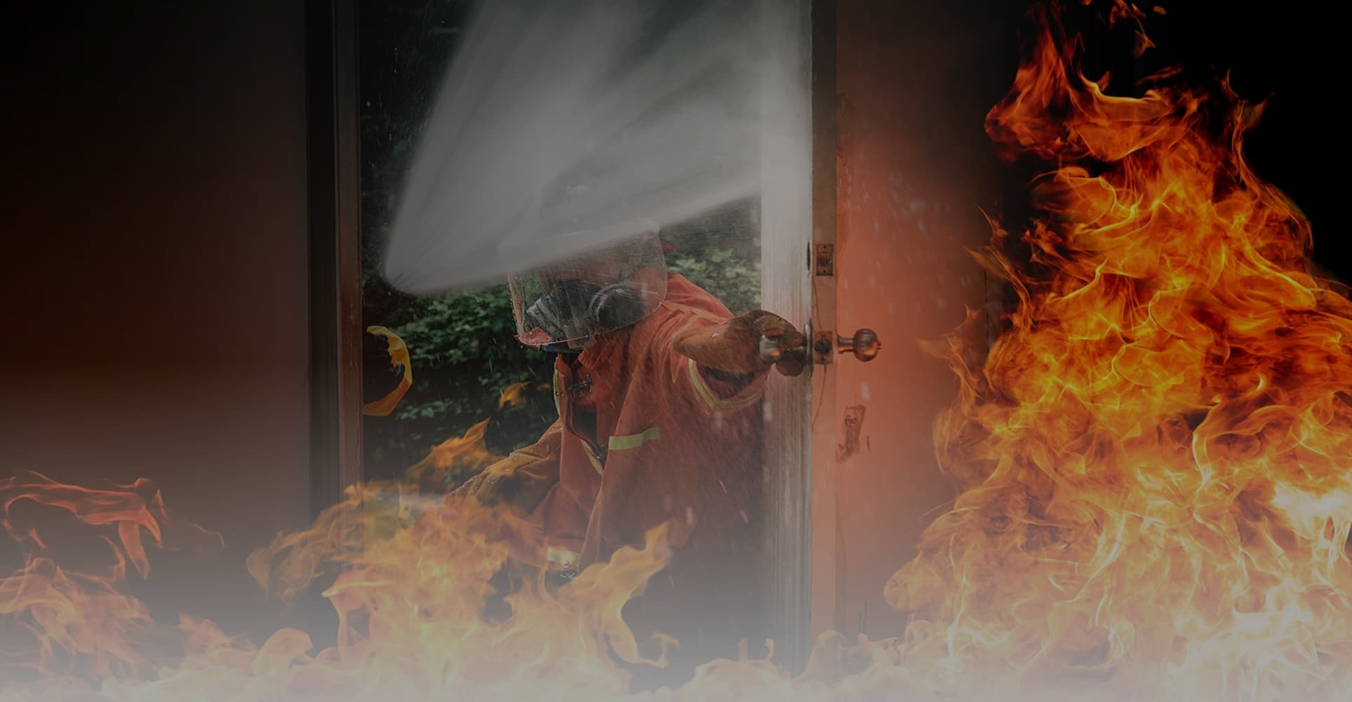 A firefighter in protective gear pushing through a door surrounded by flames and smoke, highlighting the critical role of fire doors in emergency situations